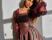 Корсетна сукня з еко-шкіри з мереживними рукавами Корсетна сукня з еко-шкіри з мереживними рукавами | PUSHKA SHOP