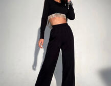 Костюм с расклешенными штанинами , декорированный бахромой из камней Костюм с расклешенными штанинами , декорированный бахромой из камней | PUSHKA SHOP