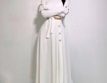 Трикотажный комплект: юбка миди с разрезом + топ с завязками на талии Трикотажный комплект: юбка миди с разрезом + топ с завязками на талии | PUSHKA SHOP