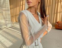 Блестящее платье-миди с запахом на груди и разрезом на юбке Блестящее платье-миди с запахом на груди и разрезом на юбке | PUSHKA SHOP