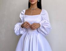 Атласна корсетна сукня з пишною подвійною спідницею та об‘ємними рукавами Атласна корсетна сукня з пишною подвійною спідницею та об‘ємними рукавами | PUSHKA SHOP