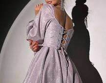 Сяюча корсетна сукня з пишною подвійною спідницею та об‘ємними рукавами Сяюча корсетна сукня з пишною подвійною спідницею та об‘ємними рукавами | PUSHKA SHOP