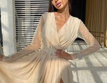 Блискуча сукня-міді із запахом на грудях і розрізом на спідниці з широким поясом Блискуча сукня-міді із запахом на грудях і розрізом на спідниці з широким поясом | PUSHKA SHOP