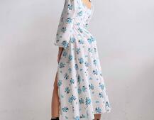 Квіткова сукня-міді з розрізом та об'ємними рукавами Квіткова сукня-міді з розрізом та об'ємними рукавами | PUSHKA SHOP