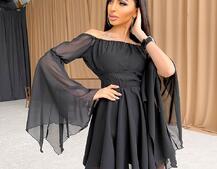 Шифоновое платье ассиметричного кроя с расклешенными рукавами и корсетом декорированный стразами  | PUSHKA SHOP