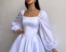 Атласна корсетна сукня з пишною подвійною спідницею та об‘ємними рукавами Атласна корсетна сукня з пишною подвійною спідницею та об‘ємними рукавами | PUSHKA SHOP