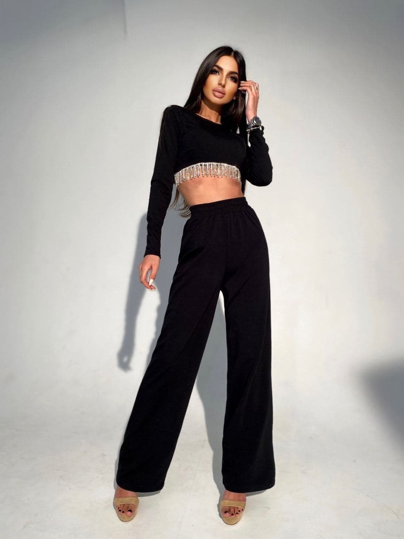 Костюм с расклешенными штанинами , декорированный бахромой из камней Костюм с расклешенными штанинами , декорированный бахромой из камней | PUSHKA SHOP