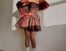 Корсетна сукня з еко-шкіри з мереживними рукавами Корсетна сукня з еко-шкіри з мереживними рукавами | PUSHKA SHOP