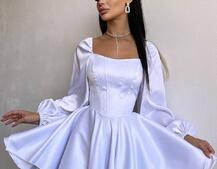 Атласна корсетна сукня з пишною подвійною спідницею та об‘ємними рукавами Атласна корсетна сукня з пишною подвійною спідницею та об‘ємними рукавами | PUSHKA SHOP