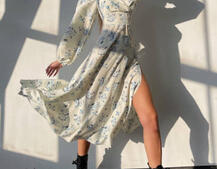 Квіткова сукня-міді з розрізом та об'ємними рукавами Квіткова сукня-міді з розрізом та об'ємними рукавами | PUSHKA SHOP