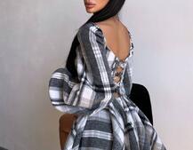 Корсетна сукня з подвійною спідницею та обʼємними рукавами у клітинку Корсетна сукня з подвійною спідницею та обʼємними рукавами у клітинку | PUSHKA SHOP