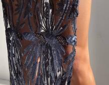 Сукня з візерунками з паєток та розрізом Сукня з візерунками з паєток та розрізом | PUSHKA SHOP