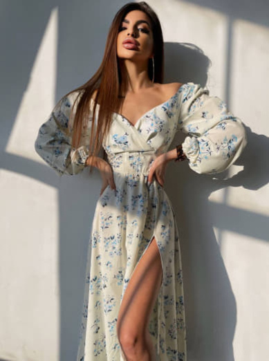 Квіткова сукня-міді з розрізом та об'ємними рукавами Квіткова сукня-міді з розрізом та об'ємними рукавами | PUSHKA SHOP