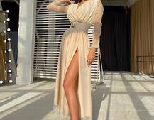 Блискуча сукня-міді із запахом на грудях і розрізом на спідниці з широким поясом Блискуча сукня-міді із запахом на грудях і розрізом на спідниці з широким поясом | PUSHKA SHOP